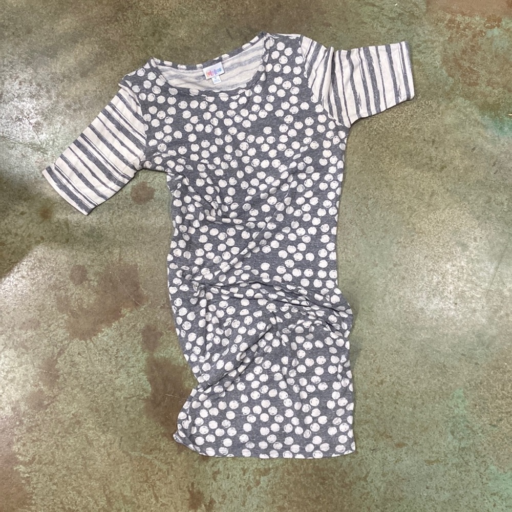 Grey and cream Julia. Stripped sleeves and circles on the body